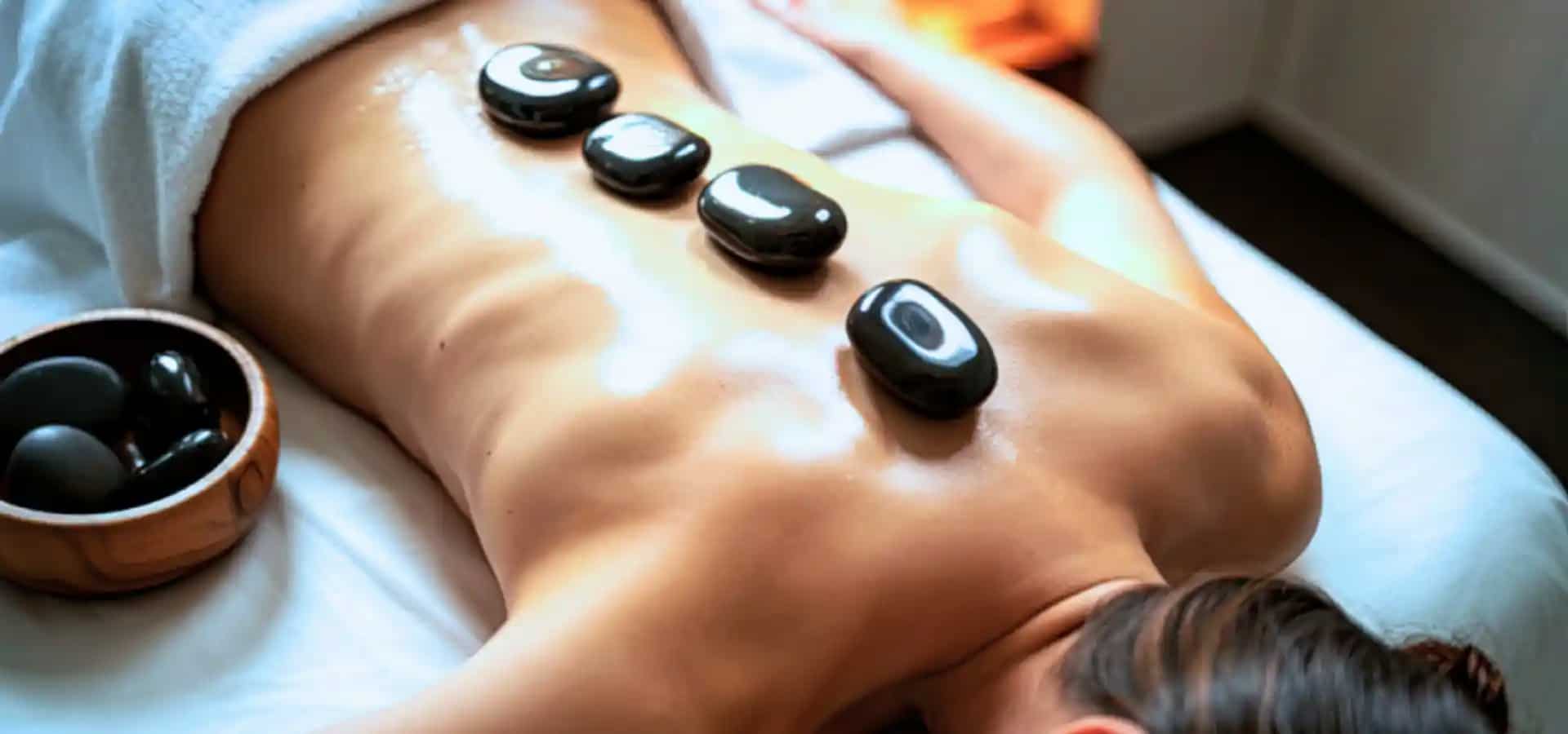 Luxury spa retreat hot stone massage therapy for deep relaxation and wellness