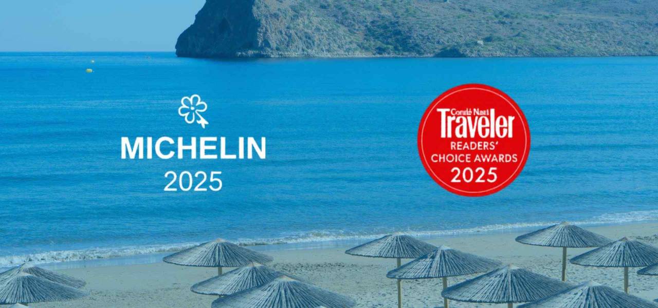 Beachfront resort scene with turquoise sea, straw umbrellas, and travel award logos including Michelin 2025 and Condé Nast Traveler Readers’ Choice Awards 2025.
